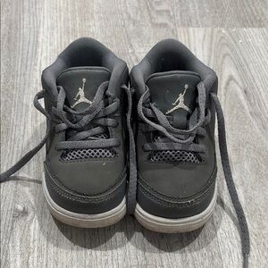 Jordan Black and Gray Sneakers with Iconic Design